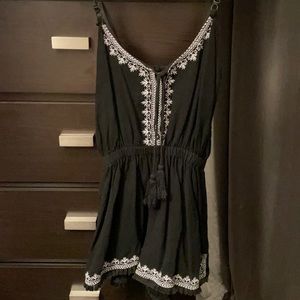 Black romper with white details